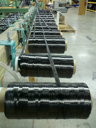 Spools of carbon fiber tows