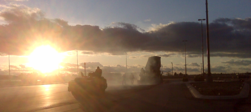 parking lot paving at sunset